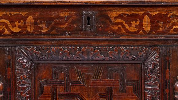 DreweattsA CARVED OAK, FRUITWOOD AND MARQUETRY CHEST OR CASSONE, 17TH CENTURY