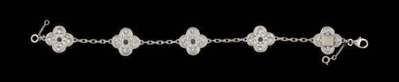Piguet - H?tel des VentesVan Cleef & Arpels, Alhambra, bracelet en or gris 750 orné de 5 motifs sertis de diamants taille brillant