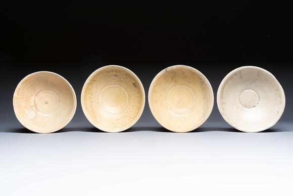 Rob Michiels AuctionsA group of 12 Chinese celadon-glazed bowls with incised floral design from the Jepara shipwreck, Fujian kilns, Song