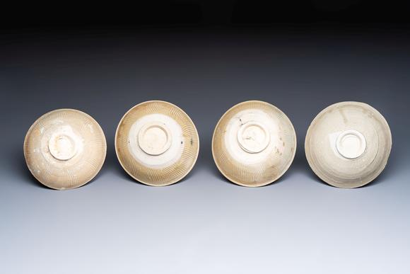 Rob Michiels AuctionsA group of 12 Chinese celadon-glazed bowls with incised floral design from the Jepara shipwreck, Fujian kilns, Song