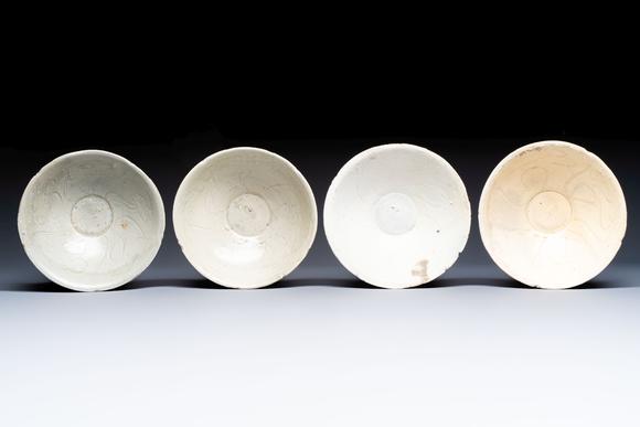Rob Michiels AuctionsA group of 12 Chinese celadon-glazed bowls with incised floral design from the Jepara shipwreck, Fujian kilns, Song