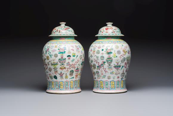Rob Michiels AuctionsA pair of Chinese famille rose 'Antiquities' covered vases and a dish, 19th C.