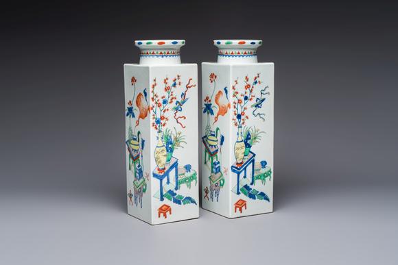 Rob Michiels AuctionsA pair of Chinese famille verte 'Antiquities' square vases, 19th C.