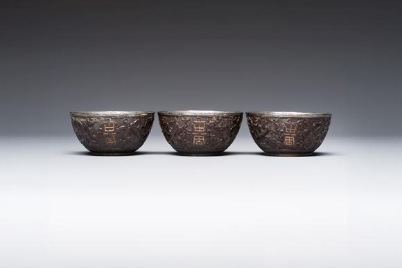 Rob Michiels AuctionsA group of 12 Chinese silver-lined coconut 'Shou 壽' bowls and cups, Wang Hengxin 王恆馨 marks, 19/20th C.