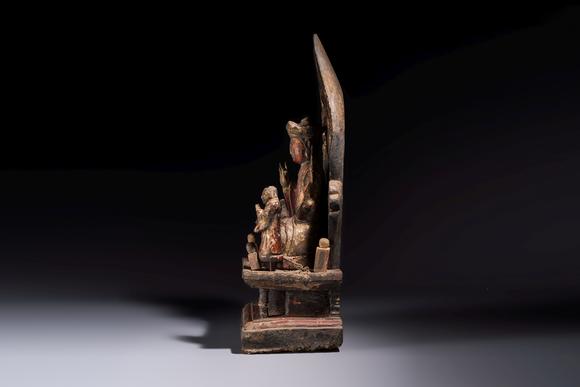 Rob Michiels AuctionsA Chinese gilt-lacquered wooden Bodhisattva and attendants on a throne, Qing