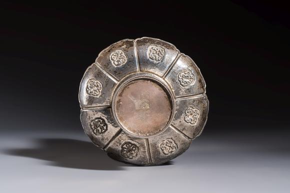 Rob Michiels AuctionsA Tibetan ritual jade bowl with a red coral-mounted silver cover and a stand, 19th C.