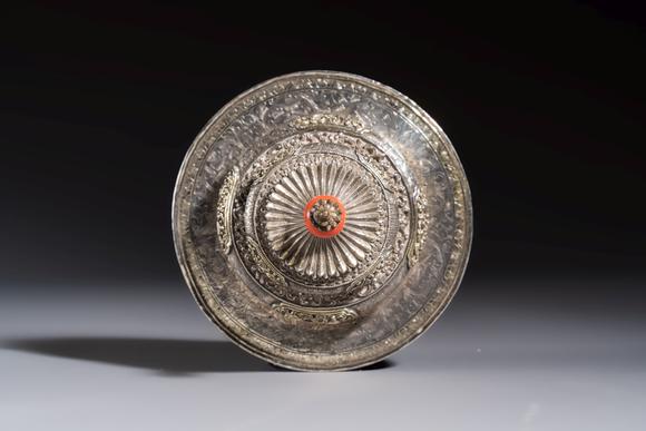 Rob Michiels AuctionsA Tibetan ritual jade bowl with a red coral-mounted silver cover and a stand, 19th C.