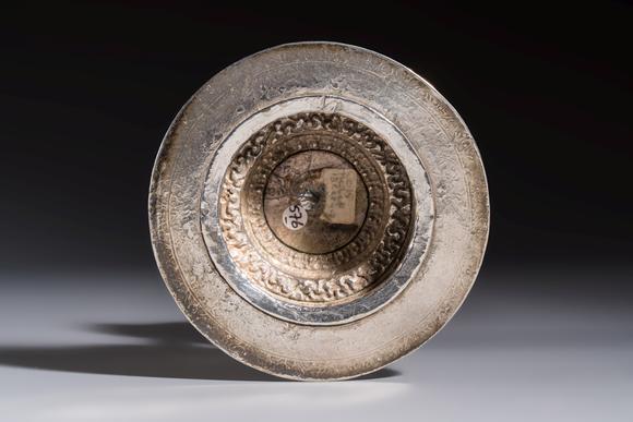 Rob Michiels AuctionsA Tibetan ritual jade bowl with a red coral-mounted silver cover and a stand, 19th C.