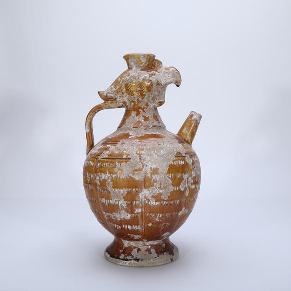 萬領(lǐng)國際遼 黃釉刻花鳳首執(zhí)壺