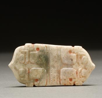 A Pale Green Rectangular Jade Pendant Incised with Double Elephant Heads, 11th–8th BCE