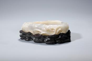 A White Jade Lotus Leaf Brush Washer with Frog Carving, Wood Stand, China, 14th–17th centuries