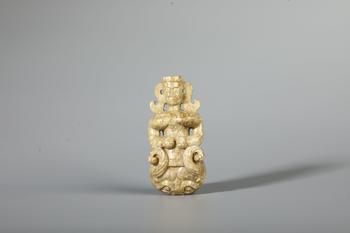 A Weathered Jade Standing Human Figure Ornament, China, 5th–3rd BCE