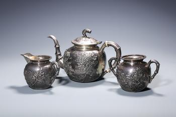 A Three-Piece Export Silver Tea Set with Chrysanthemum Reliefs, China, 16th–19th centuries