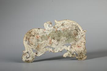 A Calcified Jade Recumbent Tiger Plaque with Granule Ground, China, 5th–3rd BCE