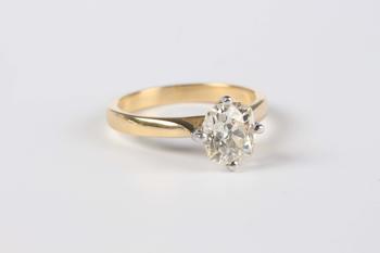 An 18ct gold ring, claw set with an old cut cushion shaped diamond, weight 5.5g, diamond dimensions approx 7.6mm x 6.9mm, ring size approx P, with a c