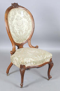 A mid-Victorian walnut showframe salon chair, height 97cm, width 51cm.
