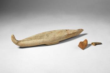Ca. 20th century AD. >
A collection comprising a finely shaped canoe model from the Trobriand Isl