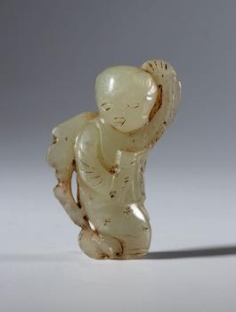 Small Hotan jade sculpture depicting a boy with a kite. China, 19th century