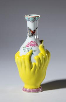 Porcelain vase painted with flowers and butterflies. The body of the vase is meant to resemble the fruit of the "Buddha's Hand" lemon tree. China, 19th century