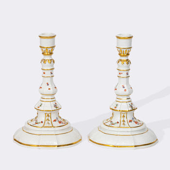 A Pair of Meissen candlesticks with Kakiemon decor.