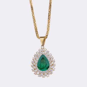 Exceptional Emerald Pendant with Rare White Diamonds on a Royal Chain.