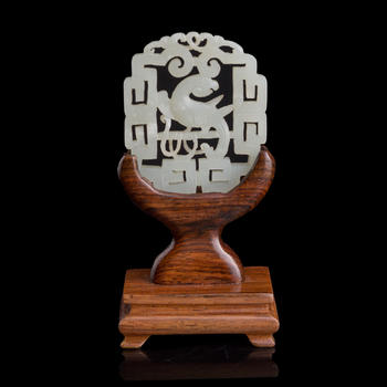十八世紀 白玉鏤雕鸚鵡佩（附木座）  A Chinese reticulated white jade 'parrot' plaque