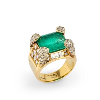 An Italian emerald and diamond ring, composed of a claw-set step-cut emerald, the claws, shoulders, and sides set with vari-cut diamonds, to plain tap