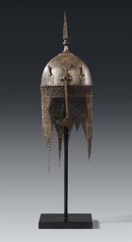 A child-sized Qajar helmet (kulah khud). Steel, iron. Persia. 19th century