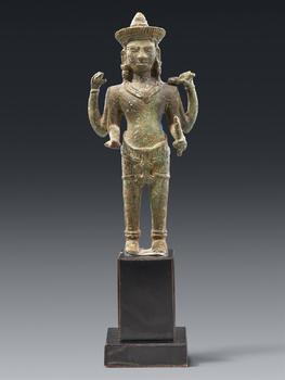 A small Khmer bronze figure of four-armed Vishnu. Cambodia. 12th century