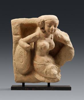 A rare Gupta terracotta relief tile fragment with a devi. Eastern India. 5/6th century