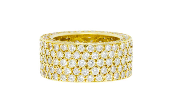 Piguet - H?tel des VentesAnneau rivière or 750 entièrement pavé de diamants taille brillant et de quelques diamants d'imitation