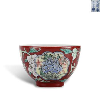 Qing Dynasty Yongzheng period, Foreign-color enameled cup with red ground and reserved floral panels