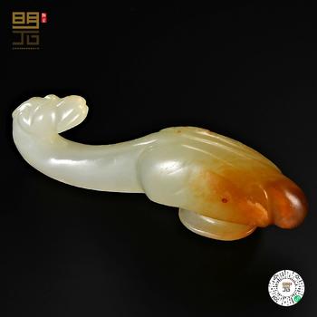 明 白玉留皮鵝首帶鉤
