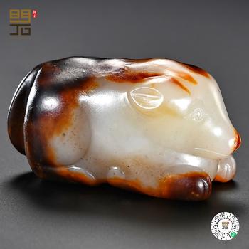 明 白玉留皮臥熊