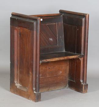 A late Victorian pitch pine cut-down pew with arched panel ends, hei