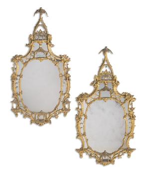 A LARGE PAIR OF CARVED GILTWOOD MIRRORS, IN GEORGE II STYLE, LATE 19TH OR EARLY 20TH CENTURY
