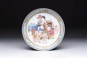 A fine Chinese famille rose eggshell plate with a lady and playing boys, Yongzheng