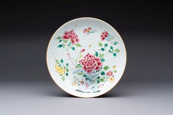 A Chinese famille rose 'Peonies' plate, Yongzheng/Qianlong