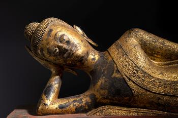 An exceptional and large gilt-lacquered bronze figure of the reclining Parinirvana Buddha, Thailand, 18th C.