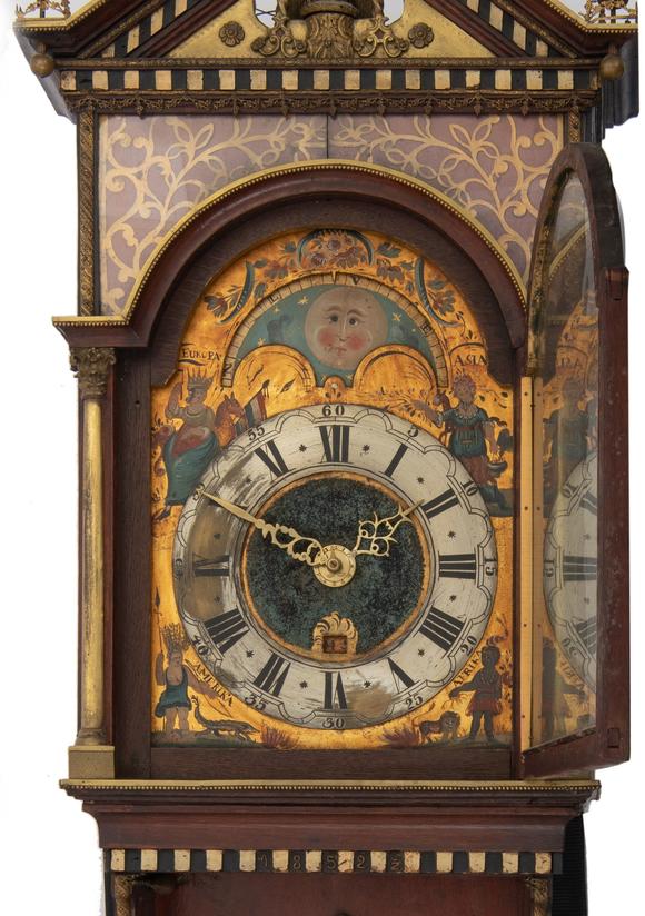 frisian movement wall clock, decorated with the four continents
