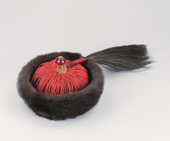 清代嵌红宝石单眼顶戴花翎