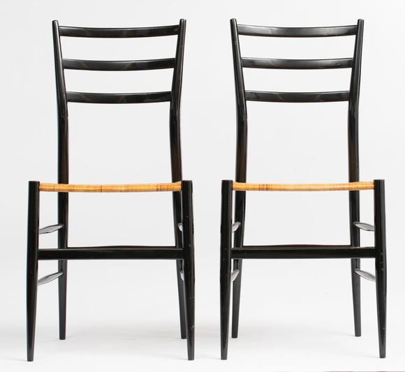 a pair of vintage black lacquered superleggera