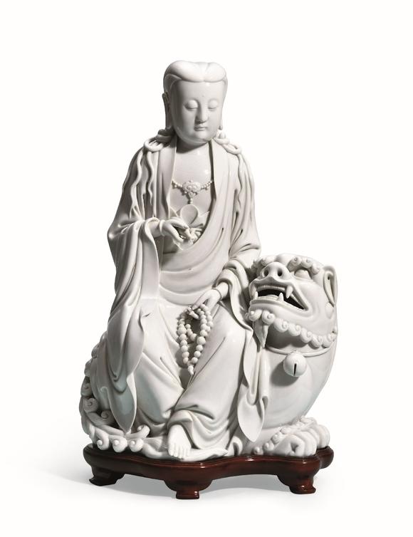 清代 德化窑骑狮观音