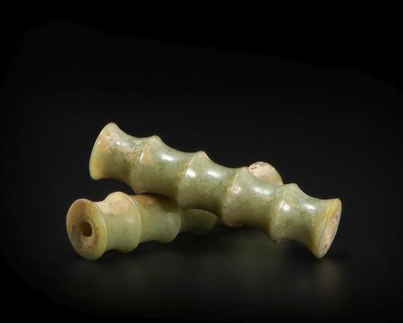 jade holding ornament in bamboo form from hongsha