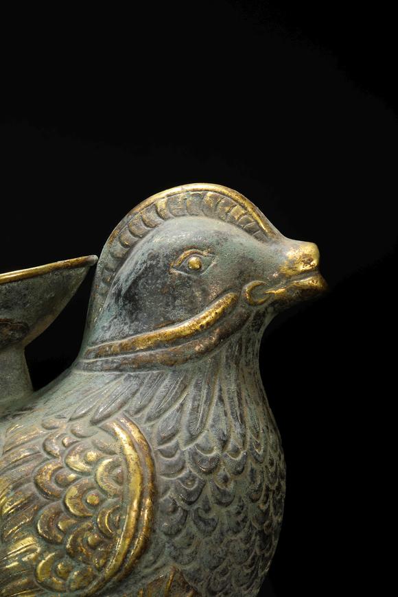 and golden vase in mandarin duck form from liao 辽代银鎏金鸳鸯壶